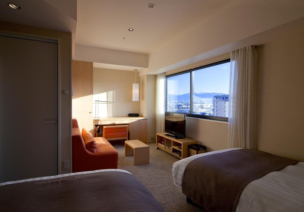Cocochee Hotel Numazu Habitación foto
