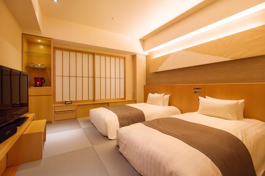 Cocochee Hotel Numazu Habitación foto